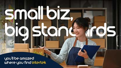 Woman holding a folder with stacks of packages behind her